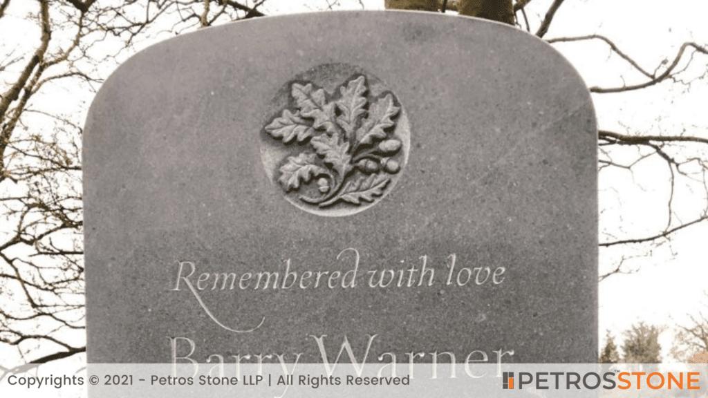 Carving of oak leaves shape gravestone