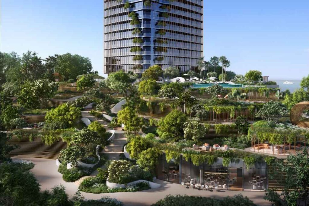 An architectural rendering of a modern skyscraper rising above a lush, multi-tiered garden terrace.
